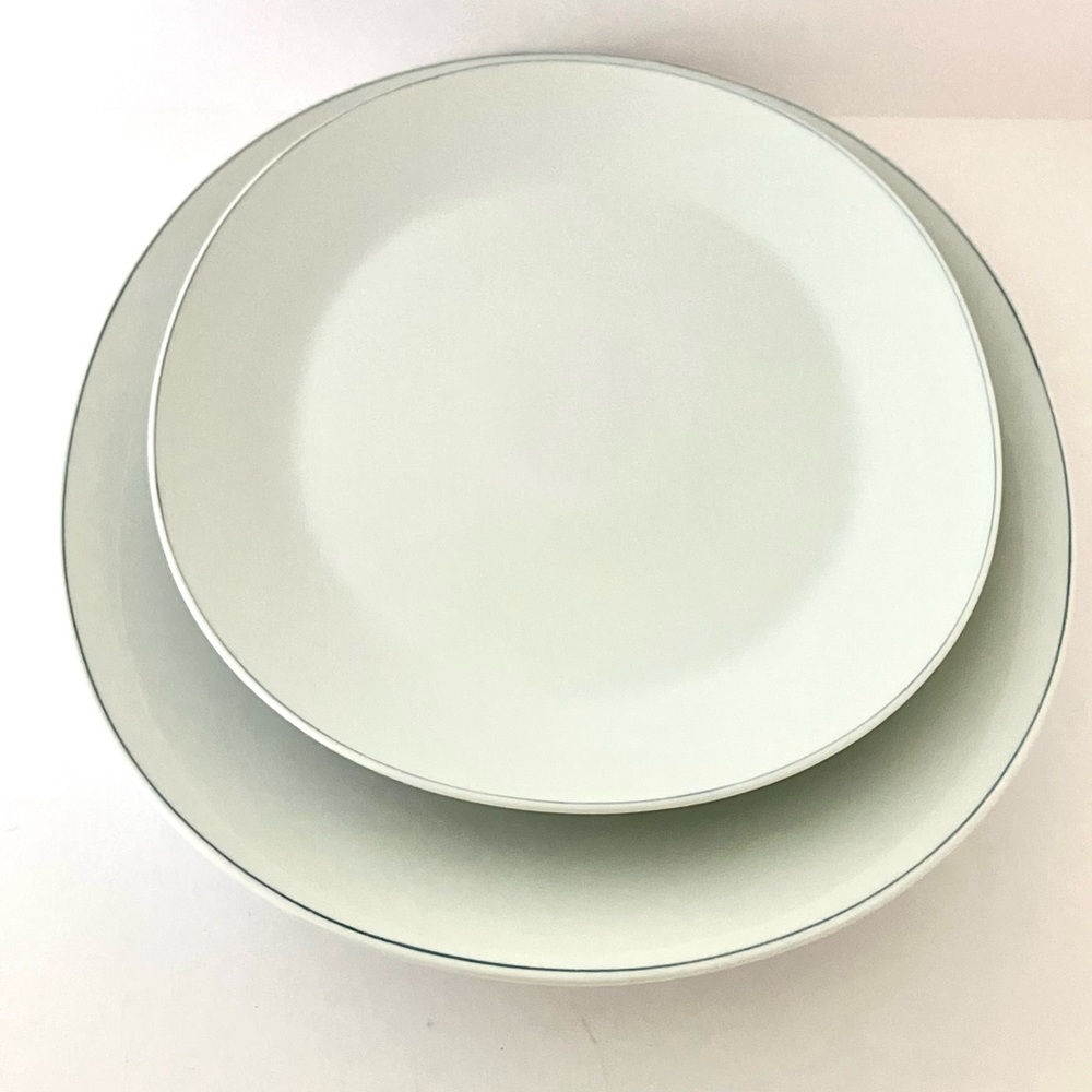 Set of 2 Rosenthal porcelain oval platters with a light blue trim.